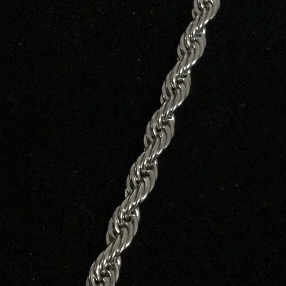 NEW 316 stainless steel rope chain plus metal boot pendant. Chain is 24” approx. - Picture 3 of 4